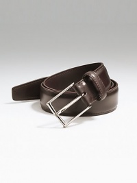 This essential accessory in smooth calfskin has stitched edges and a tapered tip. Silvertone buckle Leather keeper Made in Italy This essential accessory in smooth calfskin has stitched edges and a tapered tip. Silvertone buckle Leather keeper Made in Italy