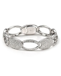 Make statement sparkle your new signature with this rhodium plated bangle from Lora Paolo. Boasting mixed crystal links, this piece perfects evening elegance. Make statement sparkle your new signature with this rhodium plated bangle from Lora Paolo. Boasting mixed crystal links, this piece perfects evening elegance.