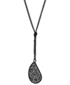 Put out the fire. The glowing crystals on BCBGeneration's rock pendant make for a smoldering, sultry look. Y-shaped chains and setting are crafted in hematite-plated mixed metal. Approximate length: 24 inches. Approximate drop: 4-1/2 inches.