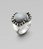 Organic and elegant, polished gray agate cabochon is richly framed in sterling silver beads.Gray agate Sterling silver Length, about 1 Imported