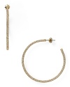 This pair of Juicy Couture hoops is a jewel box staple, simply styled in gold plate with a rim of subtle, sparkling stones.