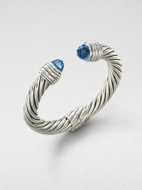 From the Color Classic Collection. A classic iconic cable design with faceted blue topaz end caps. Sterling silverBlue topazDiameter, about 2.5Slip-on styleImported From the Color Classic Collection. A classic iconic cable design with faceted blue topaz end caps. Sterling silverBlue topazDiameter, about 2.5Slip-on styleImported