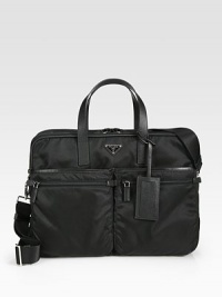 Double zip compartments and ample interior pockets enhances this classic nylon travel essential.Zip closureDouble top handlesAdjustable shoulder strapExterior, interior zip pockets13¾W x 12H x 11DMade in Italy Double zip compartments and ample interior pockets enhances this classic nylon travel essential.Zip closureDouble top handlesAdjustable shoulder strapExterior, interior zip pockets13¾W x 12H x 11DMade in Italy