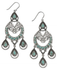 Southwestern simplicity gets some uptown allure with these earthy and elegant chandelier earrings from Lucky Brand. The semi-precious turquoise stones pair well with dark denim or a little black dress. Crafted in silver tone mixed metal. Approximate drop: 3-1/2 inches. Southwestern simplicity gets some uptown allure with these earthy and elegant chandelier earrings from Lucky Brand. The semi-precious turquoise stones pair well with dark denim or a little black dress. Crafted in silver tone mixed metal. Approximate drop: 3-1/2 inches.