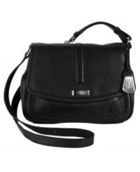 High class. The Village ave flap crossbody bag has all the makings of superior craftsmanship, complete with Cole Haan's signature soft pebble grain leather, custom hardware and an ideal, streamlined silhouette. An adjustable strap creates a purely comfortable fit. High class. The Village ave flap crossbody bag has all the makings of superior craftsmanship, complete with Cole Haan's signature soft pebble grain leather, custom hardware and an ideal, streamlined silhouette. An adjustable strap creates a purely comfortable fit.