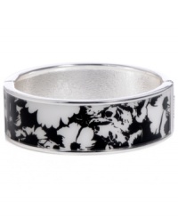 Channel the exoticism and energy of Brasil in Haskell's inspired skinny bangle. The Floral bangle features a black and white flower design, set in silver tone mixed metal with a hinge clasp. Approximate diameter: 2-1/2 inches. Approximate length: 8 inches. Item comes packaged in a turquoise gift box. Channel the exoticism and energy of Brasil in Haskell's inspired skinny bangle. The Floral bangle features a black and white flower design, set in silver tone mixed metal with a hinge clasp. Approximate diameter: 2-1/2 inches. Approximate length: 8 inches. Item comes packaged in a turquoise gift box.