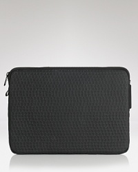 MARC BY MARC JACOBS laptop case constructed in durable, logo-embossed PVC. MARC BY MARC JACOBS laptop case constructed in durable, logo-embossed PVC.