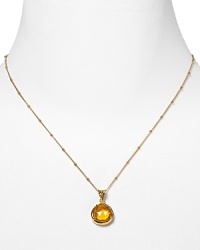 This haute bohemian pendant necklace from Coralia Leets charms with rich texture and hue. The gleaming gold setting sets off a citrine stone. This haute bohemian pendant necklace from Coralia Leets charms with rich texture and hue. The gleaming gold setting sets off a citrine stone.