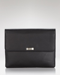 Cole Haan perfects polished practicality with this leather tablet sleeve, designed to stylishly store your technology when you're on the go. Cole Haan perfects polished practicality with this leather tablet sleeve, designed to stylishly store your technology when you're on the go.