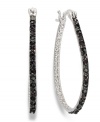 A practice in contrast. Victoria Townsend's shimmering hoops feature round-cut black diamonds (1/4 ct. t.w.) that pop against a sterling silver setting. Approximate diameter: 1 inch.