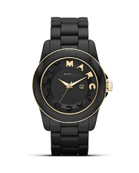 Tap into this season's athletic-inspired trend with this glossy style from MARC BY MARC JACOBS. Equal parts sporty and chic, it features chronograph movement and the brand's signature stamp. Tap into this season's athletic-inspired trend with this glossy style from MARC BY MARC JACOBS. Equal parts sporty and chic, it features chronograph movement and the brand's signature stamp.