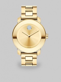 Bold watch accented with Swarovski crystals with a ion-plated goldtone stainless steel case and link bracelet. Swiss quartz movementWater resistant to 3 ATMRound ion-plated goldtone stainless steel case, 36mm (1.4) Smooth bezelGoldtone dial with Swarovski crystal dotIon-plated goldtone stainless steel link braceletMade in Switzerland Bold watch accented with Swarovski crystals with a ion-plated goldtone stainless steel case and link bracelet. Swiss quartz movementWater resistant to 3 ATMRound ion-plated goldtone stainless steel case, 36mm (1.4) Smooth bezelGoldtone dial with Swarovski crystal dotIon-plated goldtone stainless steel link braceletMade in Switzerland