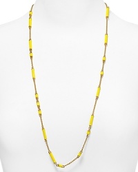 Inspired by 50's-era costume gems, kate spade new york's gold and yellow enamel strand adds a chic shot of color. With delicate, scattered stations - this piece has the style and the textured flair to spare. Inspired by 50's-era costume gems, kate spade new york's gold and yellow enamel strand adds a chic shot of color. With delicate, scattered stations - this piece has the style and the textured flair to spare.