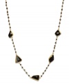 Geometrically chic! Fun chunks of onyx and petite onyx beads (52 ct. t.w.) adorn this unique station necklace. Crafted in 18k gold over sterling silver. Approximate length: 17 inches.