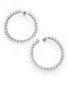 THE LOOKTextured detailsRhodium-plated sterling silver settingPost backTHE MEASUREMENTDiameter, about 2ORIGINImported