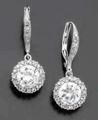 Gorgeous cubic zirconia (3 ct. t.w.) framed in crystal accents for look-at-me elegance. Rhodium plated. Drop measures 1 inch. Gorgeous cubic zirconia (3 ct. t.w.) framed in crystal accents for look-at-me elegance. Rhodium plated. Drop measures 1 inch.