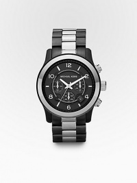 A handsome look in a mix of gunmetal and stainless steel with superior three-eye chronograph functionality. Round bezel Quartz movement Three-eye chronograph functionality Water resistant to 10 ATM Date function at 4 o'clock Second hand Stainless steel/gunmetal case: 45mm (1.77) Stainless steel/gunmetal bracelet Deployment clasp Made in Switzerland A handsome look in a mix of gunmetal and stainless steel with superior three-eye chronograph functionality. Round bezel Quartz movement Three-eye chronograph functionality Water resistant to 10 ATM Date function at 4 o'clock Second hand Stainless steel/gunmetal case: 45mm (1.77) Stainless steel/gunmetal bracelet Deployment clasp Made in Switzerland
