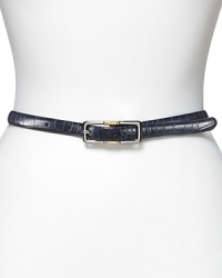 Lauren Ralph Lauren's belt in halting red is in croco-embossed leather and reverses to a smooth black leather for modern versatility. Crafted with a two-tone reversible, rectangular buckle that rotates from silver to gold-tone on a single screw. Lauren Ralph Lauren's belt in halting red is in croco-embossed leather and reverses to a smooth black leather for modern versatility. Crafted with a two-tone reversible, rectangular buckle that rotates from silver to gold-tone on a single screw.