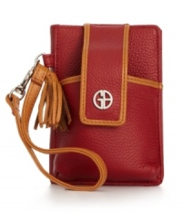 Say hello to something chic with this petite PDA case from Giani Bernini. Ultra-soft leather is outfitted with secure front flap closure, signature hardware, flirty tassel and convenient wristlet, while inside is organized with card slots and clear ID window. Simply snap and go. Say hello to something chic with this petite PDA case from Giani Bernini. Ultra-soft leather is outfitted with secure front flap closure, signature hardware, flirty tassel and convenient wristlet, while inside is organized with card slots and clear ID window. Simply snap and go.