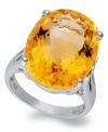 Richly colored with plenty of sparkle, this fun, bright ring features a dramatic oval-cut citrine (14-9/10 ct. t.w.) set in sterling silver. Size 7.