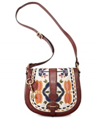 Reminiscent of the classic girl-meets-boy look, this Vintage Re-Issue from Fossil was inspired by Italian bags from the '70s. The contrast of buttery soft leather and floral feminine embroidery, accented with brass-tone hardware and detachable key, complete the look with charm and grace Reminiscent of the classic girl-meets-boy look, this Vintage Re-Issue from Fossil was inspired by Italian bags from the '70s. The contrast of buttery soft leather and floral feminine embroidery, accented with brass-tone hardware and detachable key, complete the look with charm and grace