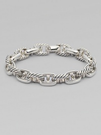 Defined anchor links handsomely crafted in fine sterling silver.Sterling SilverAbout 9Lobster claspImported