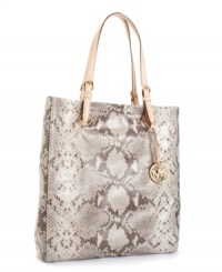 Bold color pops against this season's neutrals. Add a dash of color with the shiny patent tote from MICHAEL Michael Kors. Bold color pops against this season's neutrals. Add a dash of color with the shiny patent tote from MICHAEL Michael Kors.