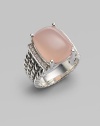 From the Wheaton Collection. A faceted cushion of milky pink opal, edged by rows of diamonds, in a wide cable band of sterling silver.Diamonds, 0.16 tcw Pink opal Sterling silver Width, about ½ Imported