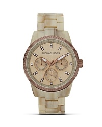 Put on the ritz with this acetate bracelet watch from MICHAEL Michael Kors. Chronograph movement ensures practical performance, while Swarovski crystal accents make this a fashion piece. Put on the ritz with this acetate bracelet watch from MICHAEL Michael Kors. Chronograph movement ensures practical performance, while Swarovski crystal accents make this a fashion piece.