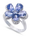 A style that's certain to grow on you. This beautiful flower ring showcases pear and round-cut tanzanite (3 ct. t.w.) and stunning diamond accents in 14k white gold.