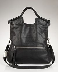 Vacation looks love this lush tote, rendered in tropical-hued leather for a fresh take on this tried and true Foley + Corinna bag. Vacation looks love this lush tote, rendered in tropical-hued leather for a fresh take on this tried and true Foley + Corinna bag.