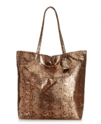 Go bold with this stunning snakeskin print style from Carlos by Carlos Santana. An all-over print covers this oversized tote design for the perfect combination of fashion and function. Go bold with this stunning snakeskin print style from Carlos by Carlos Santana. An all-over print covers this oversized tote design for the perfect combination of fashion and function.