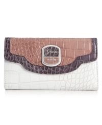 Get organized in the most exotic way with this cool, croc-embossed clutch from Fossil. Ideally sized to slip inside a handbag, it boasts plenty of pockets and compartments for all the essentials. Get organized in the most exotic way with this cool, croc-embossed clutch from Fossil. Ideally sized to slip inside a handbag, it boasts plenty of pockets and compartments for all the essentials.