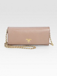 Saffiano leather in a foldover silhouette with goldtone hardware and chain strap.Detachable shoulder strap, 22¼ dropFlap snap closureMetal lettering logoGold-plated hardwareTwo outside open pockets under flapOne center zip compartmentOne inside open pocketSix credit card slotsFully lined8¼W X 4H X 1DMade in Italy Saffiano leather in a foldover silhouette with goldtone hardware and chain strap.Detachable shoulder strap, 22¼ dropFlap snap closureMetal lettering logoGold-plated hardwareTwo outside open pockets under flapOne center zip compartmentOne inside open pocketSix credit card slotsFully lined8¼W X 4H X 1DMade in Italy