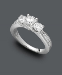 The finishing touch to a perfect moment. This exquisite diamond engagement ring features a three-stone design with channel-set diamonds at the shoulders (1-1/2 ct. t.w.). Crafted in 14k white gold. The finishing touch to a perfect moment. This exquisite diamond engagement ring features a three-stone design with channel-set diamonds at the shoulders (1-1/2 ct. t.w.). Crafted in 14k white gold.