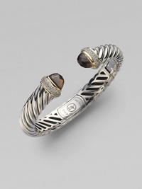 From the Waverly Collection. A sculpted cable design of sterling silver, capped with smoky quartz, and banded with 18k yellow gold and pavé diamonds.Diamonds, 0.40 tcw 18k yellow gold Sterling silver Cable, 10mm Diameter, about 2¼ Hinge clasp Imported From the Waverly Collection. A sculpted cable design of sterling silver, capped with smoky quartz, and banded with 18k yellow gold and pavé diamonds.Diamonds, 0.40 tcw 18k yellow gold Sterling silver Cable, 10mm Diameter, about 2¼ Hinge clasp Imported
