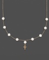 The perfect First Communion gift for a special little girl. This necklace features cultured freshwater pearls (5-6 mm) and a petite 14k gold cross charm. Set in 14k gold. Approximate length: 13 inches. Approximate drop: 1/2 inch.