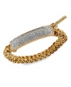 Make a name for yourself with this half-stretch ID bracelet from Kenneth Cole New York. Crafted from gold-tone mixed metal, the ID plate features silver-colored glitter accents for a lustrous effect. Item comes packaged in a signature Kenneth Cole New York Gift Box. Approximate diameter: 2-1/2 inches.