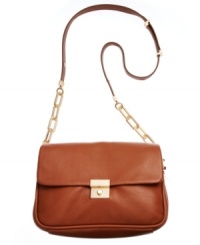 Whether dashing across town or across the country, this versatile design from DKNY will get you there in style. Posh goldtone accents and a classic pushlock closure add glam appeal to this everyday look. Whether dashing across town or across the country, this versatile design from DKNY will get you there in style. Posh goldtone accents and a classic pushlock closure add glam appeal to this everyday look.