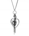 Attract an audience with charming style. GUESS necklace features a double heart pendant, a crystal fireball charm, and chic chain and crystal accents. Crafted in hematite tone mixed metal. Approximate length: 28 inches + 2-inch extender. Approximate drop: 2-1/2 inches.