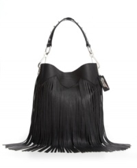 A little fringe goes a long way on this eye-catching Carlos by Carlos Santana bag. A studded handle and shiny silvertone hardware perfectly complete this rocker-chic design. A little fringe goes a long way on this eye-catching Carlos by Carlos Santana bag. A studded handle and shiny silvertone hardware perfectly complete this rocker-chic design.