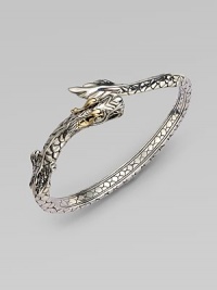 From the Naga Collection. This stylized design features a dragon in sleek sterling silver accented with 18k gold detailing. Sterling silver18k goldDiameter, about 2¼Slip-on styleImported From the Naga Collection. This stylized design features a dragon in sleek sterling silver accented with 18k gold detailing. Sterling silver18k goldDiameter, about 2¼Slip-on styleImported