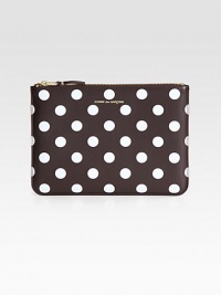 A secure zip pouch in a fun and whimsical polka dot printed leather.Top zip closureFully lined8¾W X 6¼H X ½DImported A secure zip pouch in a fun and whimsical polka dot printed leather.Top zip closureFully lined8¾W X 6¼H X ½DImported