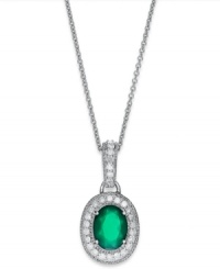 Make a sparkling impact with this pretty pendant. Set in sterling silver, an oval-cut green agate (1-1/10 ct. t.w.) glows against a halo of round-cut diamonds (1/4 ct. t.w.). Approximate length: 18 inches. Approximate drop: 1/2 inch. Make a sparkling impact with this pretty pendant. Set in sterling silver, an oval-cut green agate (1-1/10 ct. t.w.) glows against a halo of round-cut diamonds (1/4 ct. t.w.). Approximate length: 18 inches. Approximate drop: 1/2 inch.