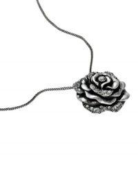 Love can be a complicated affair. Fossil embraces both sides of romance with this dark hematite-plated mixed metal rose pendant accented with sparkling crystals. Approximate length: 18 inches. Approximate drop: 1/2 inch. Love can be a complicated affair. Fossil embraces both sides of romance with this dark hematite-plated mixed metal rose pendant accented with sparkling crystals. Approximate length: 18 inches. Approximate drop: 1/2 inch.