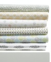 Express your artistic side. Featuring abstract dots in tones of lime and aubergine, Style&co.'s Pointelle sheet set dresses your bed in chic comfort. Featuring pure cotton treated with a special finish for greater softness after every wash. Pillowcases feature envelope closure. (Clearance)