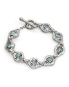 Genuine David Yurman (TM) Bracelet. Charles Krypell Sterling Silver & Blue Topaz Toggle Bracelet, 9/10 Condition. grams in weight. 100% Satisfaction Guaranteed.