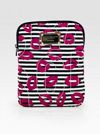 A bold and playful print on lightweight nylon with a topstitched logo motif, perfect for your favorite tech.Top zip closureFully lined7¾W X 10½H X 1DImportedPlease note: Tablet not included. A bold and playful print on lightweight nylon with a topstitched logo motif, perfect for your favorite tech.Top zip closureFully lined7¾W X 10½H X 1DImportedPlease note: Tablet not included.