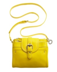 Grab hold of this adorable design from Nine West for the perfect weekend-ready style. This easy-going crossbody silhouette is accented with shiny silvertone hardware and convenient pockets on exterior and inside. Grab hold of this adorable design from Nine West for the perfect weekend-ready style. This easy-going crossbody silhouette is accented with shiny silvertone hardware and convenient pockets on exterior and inside.