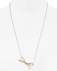Take a bow. Cast in 12-karat gold plate, this delicate kate spade new york necklace flaunts a sweet simplicity. Take a bow. Cast in 12-karat gold plate, this delicate kate spade new york necklace flaunts a sweet simplicity.